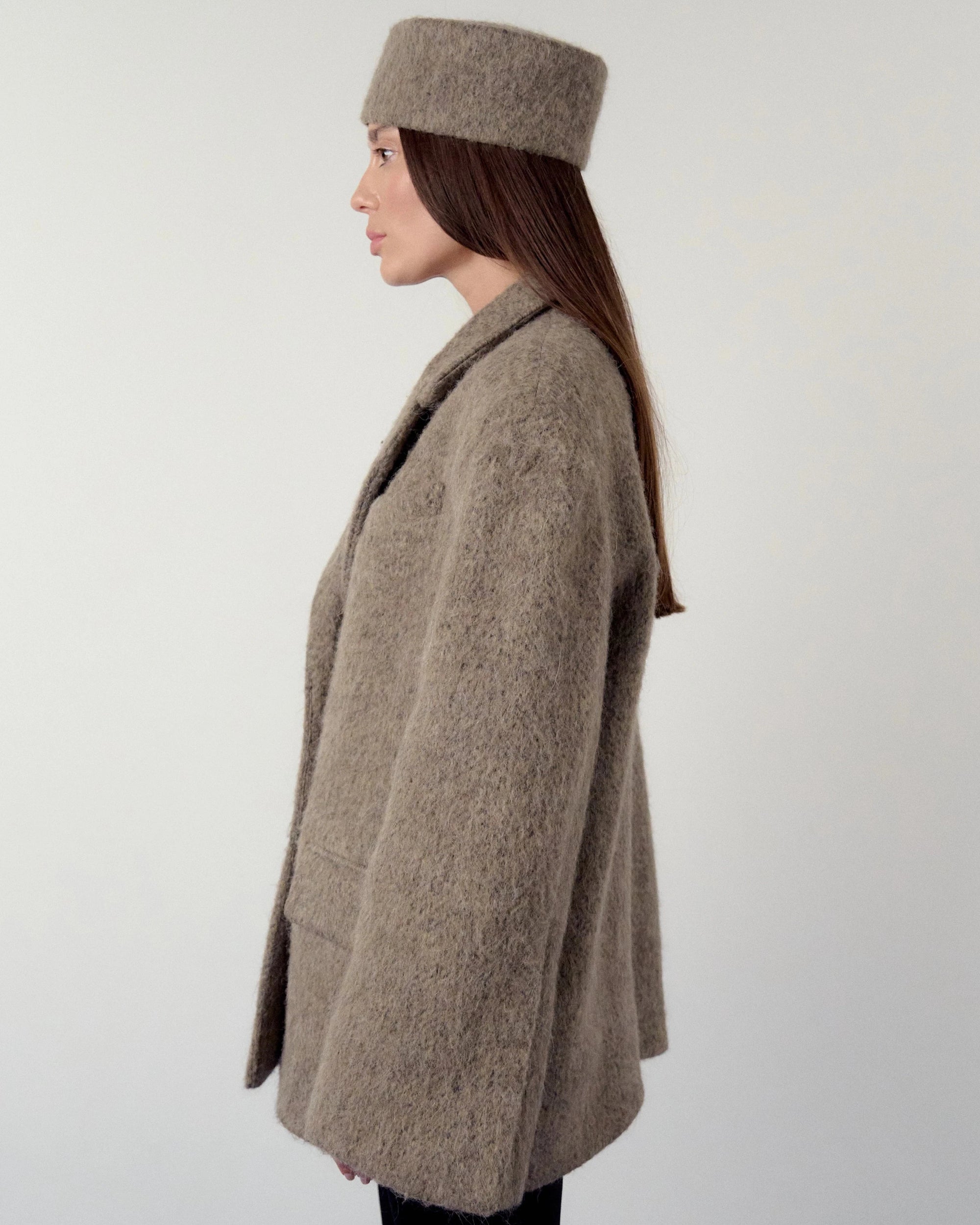 Pillbox hat in warm grey