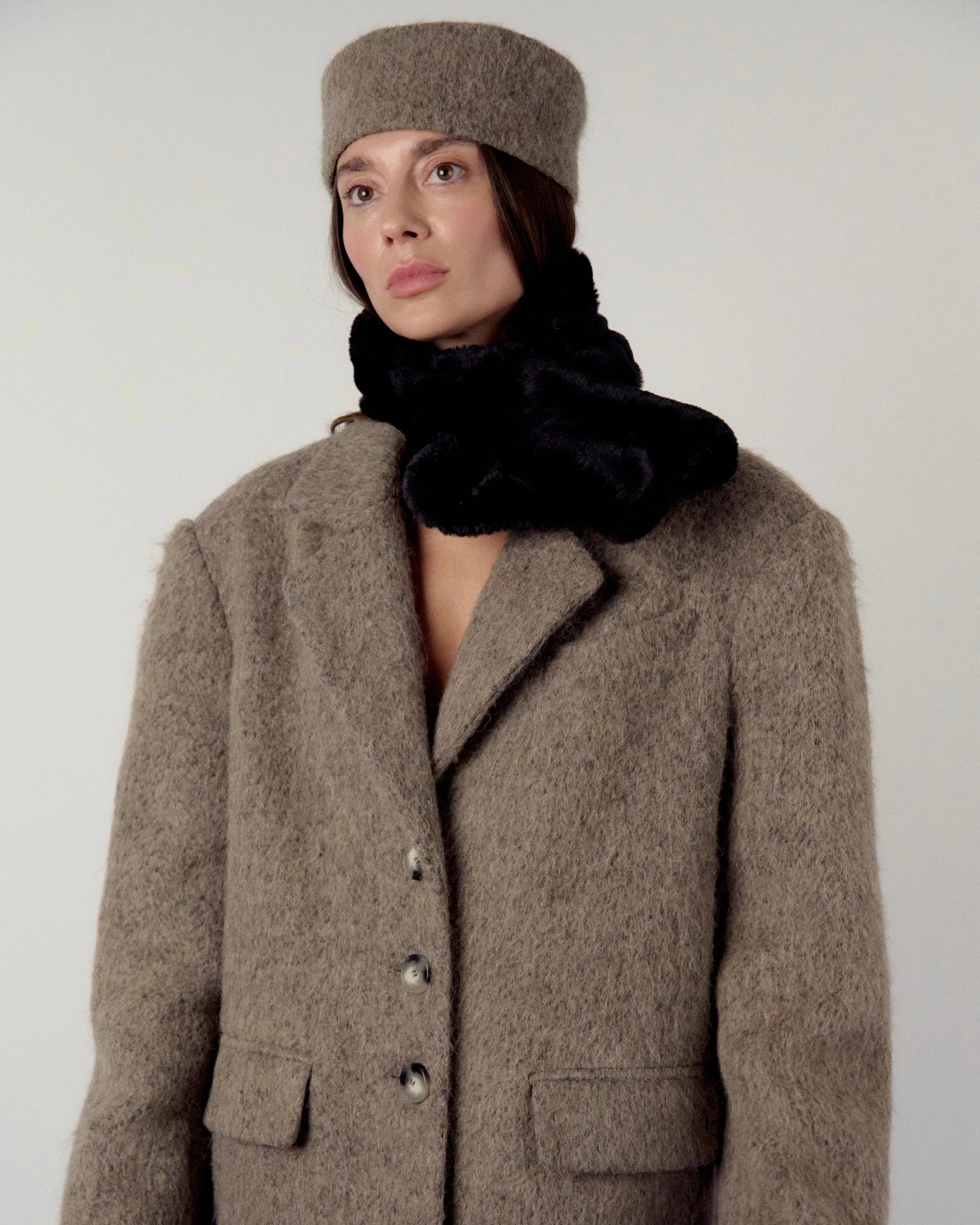 Pillbox hat in warm grey