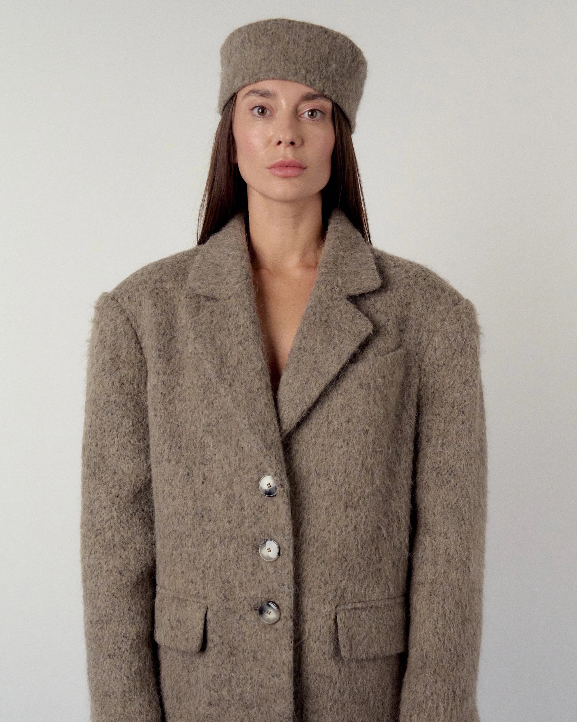 Pillbox hat in warm grey